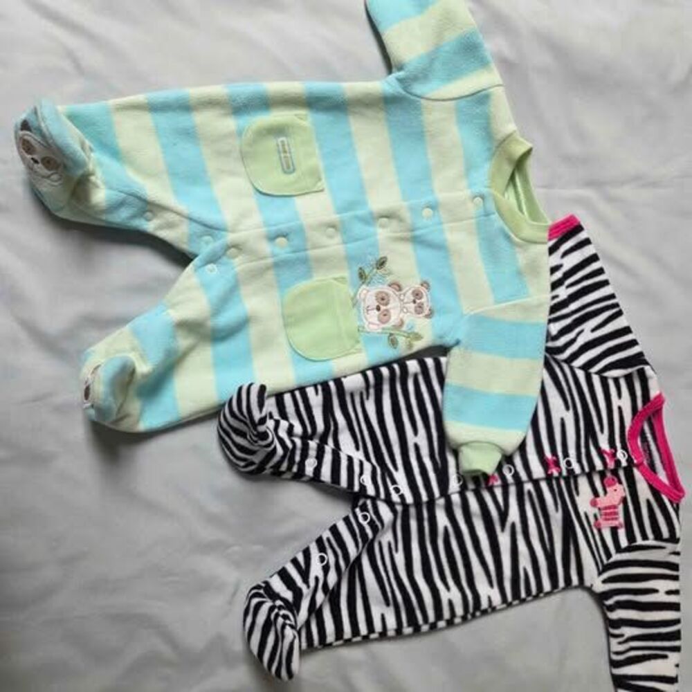 2 Carters size Newborn fleece sleepers pink zebra and panda bear print